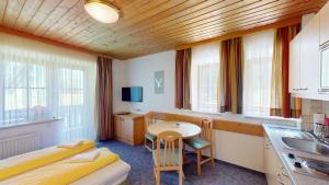 TV a/nebo společenská místnost v ubytování Hotel - Restaurant - Sonnblick