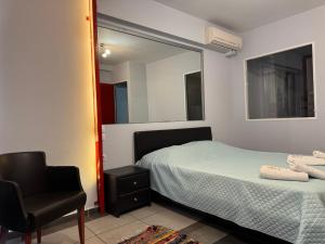 Postel nebo postele na pokoji v ubytování Mezzanine