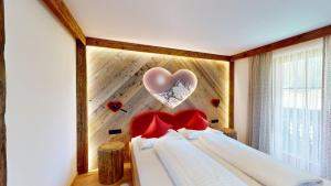 Postel nebo postele na pokoji v ubytování Hotel - Restaurant - Sonnblick