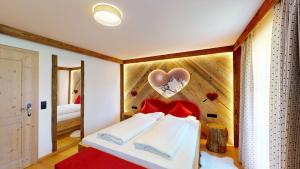 Postel nebo postele na pokoji v ubytování Hotel - Restaurant - Sonnblick