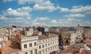 an aerial view of a city with buildings at Appart en Hypercentre - Le Clemenceau in Bordeaux +8 photos
