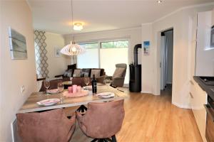 Khu vực ghế ngồi tại Sielhuus 5, Ferienwohnung mit Sauna in Fedderwardersiel