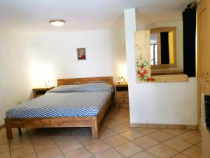 Letto o letti in una camera di Antico Fienile By Go new Location