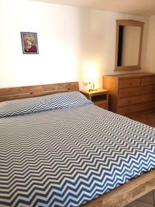 Letto o letti in una camera di Antico Fienile By Go new Location