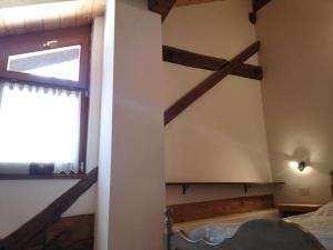 Letto o letti in una camera di Antico Fienile By Go new Location