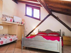 Letto o letti in una camera di Antico Fienile By Go new Location