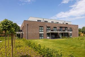 Zahrada ubytování Ankerpunkt Südost - Ferienwohnung mit Garten und Sauna