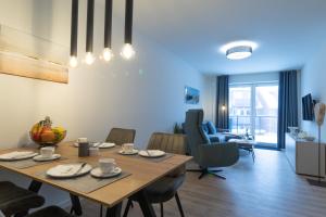 Posezení v ubytování Ferienwohnung Hyggelig - Strandnah mit Sauna und Balkon