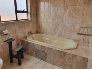 Koupelna v ubytování RnK Guesthouse