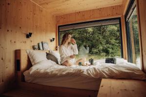 Ένα ή περισσότερα κρεβάτια σε δωμάτιο στο Parcel Tiny House au coeur des vignes proche Mont Ventoux