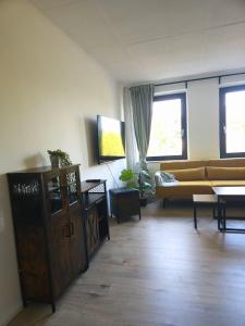 TV a/nebo společenská místnost v ubytování Industiral Design - 24h Self-Check- in - bis 7 Personen - zentrale Lage - Parkplatz - WiFi - Monteure