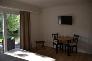 TV a/nebo společenská místnost v ubytování Hotel Misty