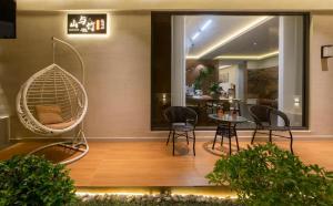 Mountain and Bamboo Holiday Homestay Zhangjiajie Forest Park Branch的休息区