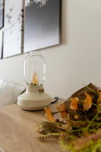 a glass blender sitting on top of a table at Maison Emeraude - Escapade bistrot chic & nature - Proche Vannes in Sérent +41 photos