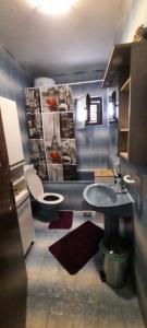 Kúpeľňa v ubytovaní Apartmani Jenny i Tania