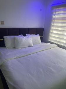 Letto o letti in una camera di Demayafolo suite
