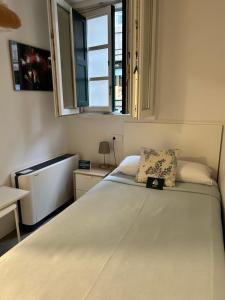 Cama o camas de una habitación en Pensión Rua Nova
