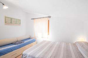 Postel nebo postele na pokoji v ubytování Casa Zip