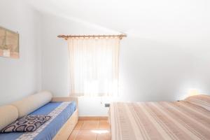 Postel nebo postele na pokoji v ubytování Casa Zip