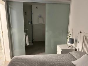 Cama o camas de una habitación en Pensión Rua Nova