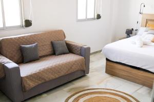 Ένα ή περισσότερα κρεβάτια σε δωμάτιο στο Duplex-Loft Albaycín