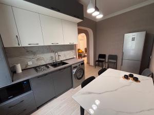 Eldhús eða eldhúskrókur á Geo Inn