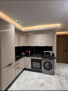 Kuchyň nebo kuchyňský kout v ubytování Stay luxe