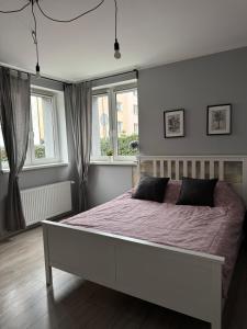 Posteľ alebo postele v izbe v ubytovaní Apartament ToTuGdynia 2
