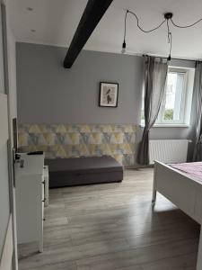 Posteľ alebo postele v izbe v ubytovaní Apartament ToTuGdynia 2
