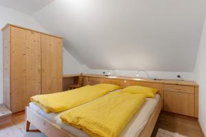 Postel nebo postele na pokoji v ubytování Rielingerhof