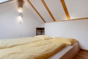Postel nebo postele na pokoji v ubytování Rielingerhof
