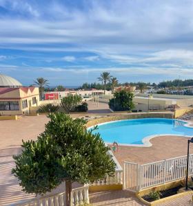 a view of a swimming pool at a resort at F3Sun CASA JACOB - 2 BR, Green Oasis, Costa Calma, Fuerteventura in Costa Calma