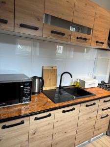 Kuchyňa alebo kuchynka v ubytovaní Apartament ToTuGdynia 2