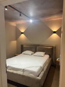 Postel nebo postele na pokoji v ubytování Apartments Duje