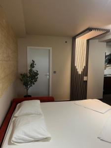 Postel nebo postele na pokoji v ubytování Apartments Duje