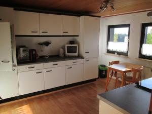 Kuchyň nebo kuchyňský kout v ubytování FeWo Ahornweg + 4 fotografie