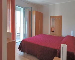 A bed or beds in a room at Al Flor Még 18 kép