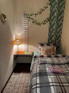 Ένα ή περισσότερα κρεβάτια σε δωμάτιο στο Luxurious En-suit room with Sauna
