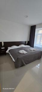 Postel nebo postele na pokoji v ubytování Apartmán u Jeleňa