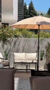 Patio nebo venkovní prostory v ubytování Kaneo Central Apartments
