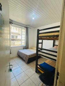 Ένα ή περισσότερα κρεβάτια σε δωμάτιο στο Hostel Proximo a Shopping total - Rodoviaria - Hosp Presidente Vargas