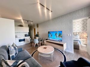 TV a/nebo společenská místnost v ubytování Coral Cove - Mossel Cove Unit 211