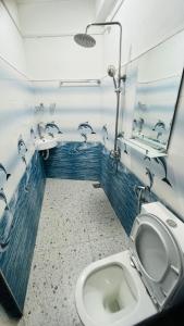 Koupelna v ubytování Pick Me Village