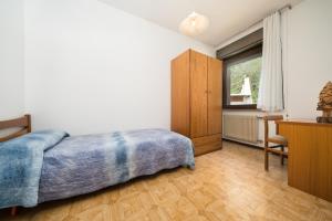 Postelja oz. postelje v sobi nastanitve Albergo Bar Firi