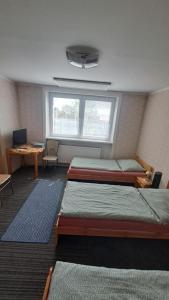 Postel nebo postele na pokoji v ubytování Ubytováni v soukromí Na Podluží