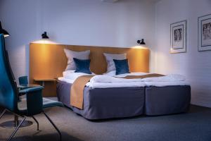 Voodi või voodid majutusasutuse Frederik VI's Hotel toas +37 fotot