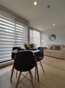 Area tempat duduk di Apartamento Moderno Centro Internacional 2 Ambientes