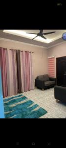 Et opholdsområde på Dya Homestay Pendang 2