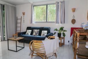 Posezení v ubytování Sur la plage coco, au bord du lagon de Ste Anne + 49 fotografií