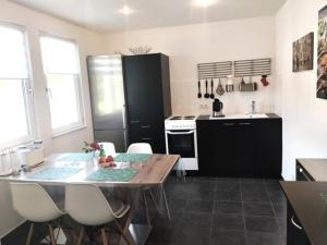 Η κουζίνα ή μικρή κουζίνα στο Ferienhaus Ferienwohnung Schöneberg